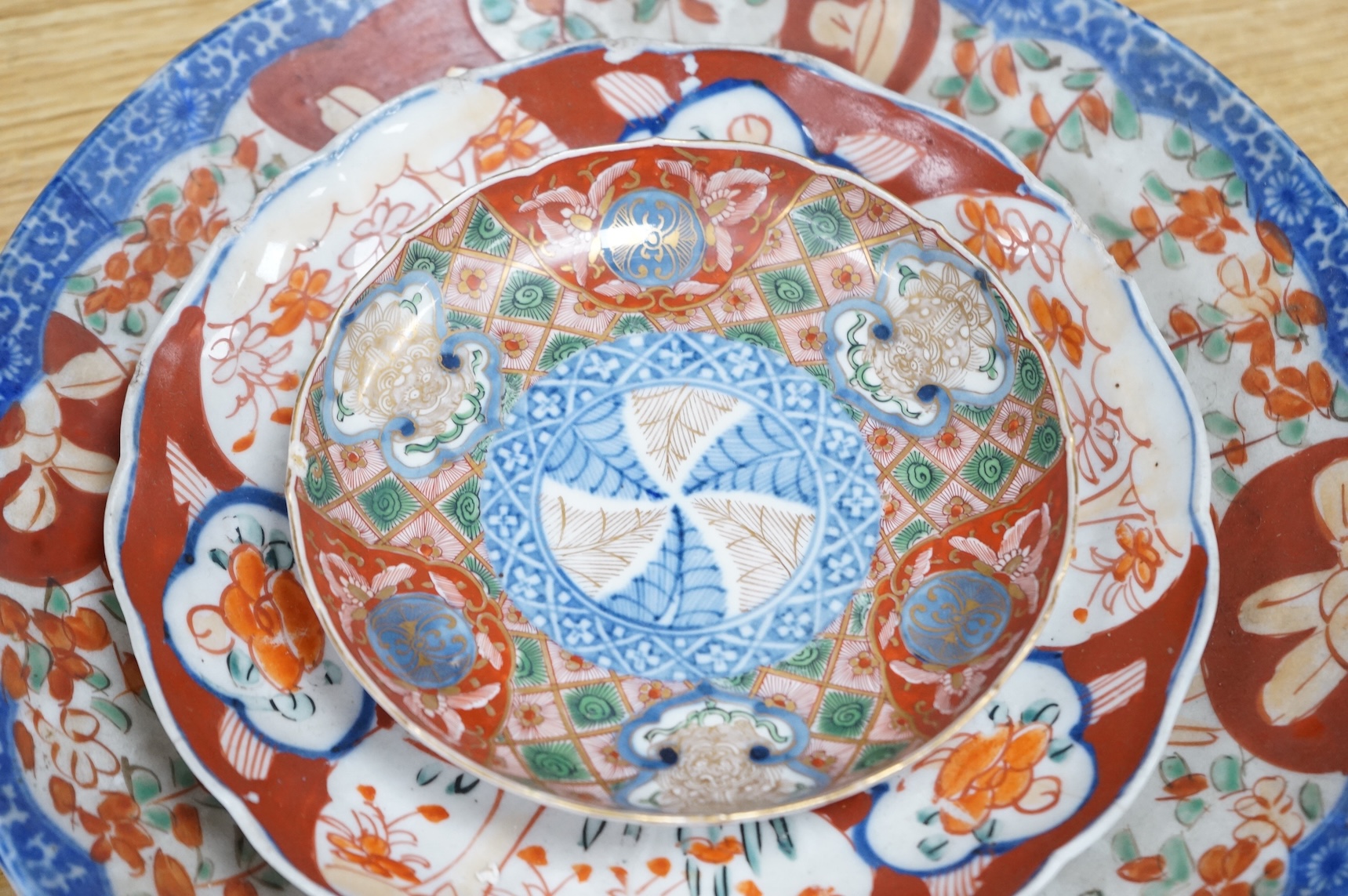 Three Japanese Imari dishes, largest 30.5cm